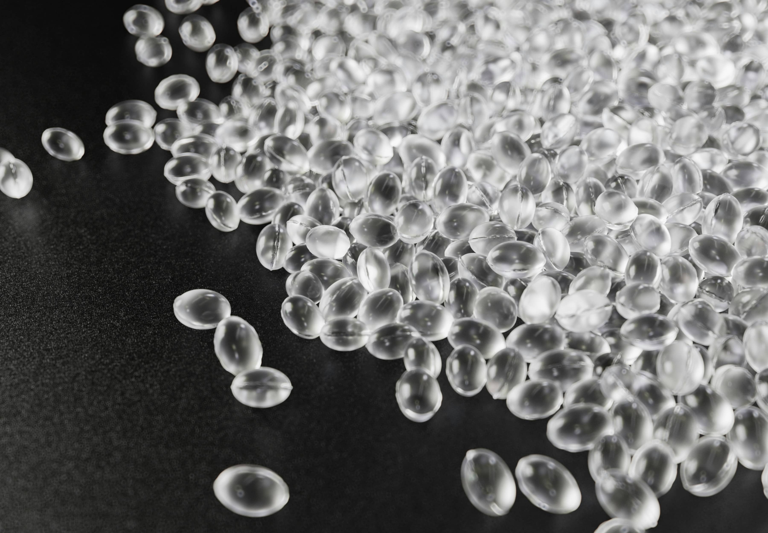 Small translucent beads of microplastics.